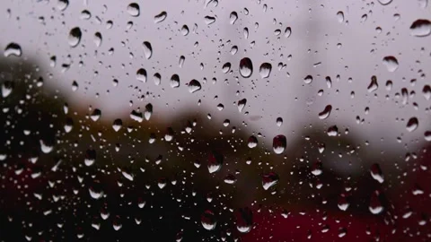 Close up details of water drops on window glass after heavy autumn rain downpour Stock Footage 163186419