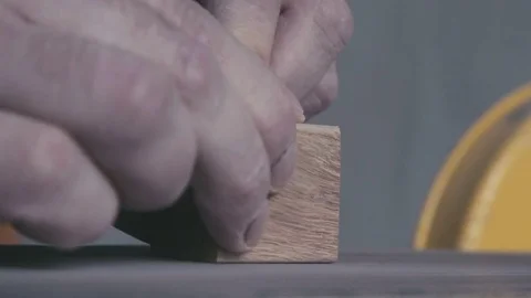 Close-up details of the work of a carpenter. Hands a joiner Stock Footage 72731258
