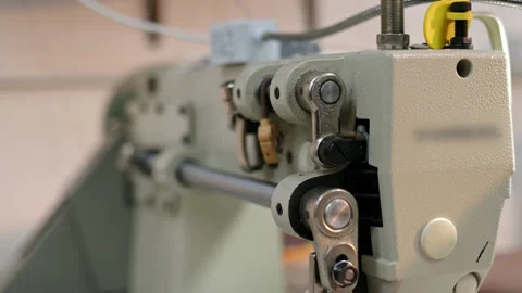 Close up details of working sewing machine during day in sunlight. Reliable Stock Footage 178156095
