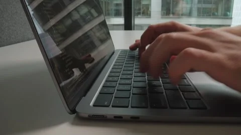 Close up of developer hands typing program code on laptop keyboard. Stock Footage 251441450
