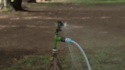Close-up device for artificial watering of greenery or fields. Artificial Video stock 196026922