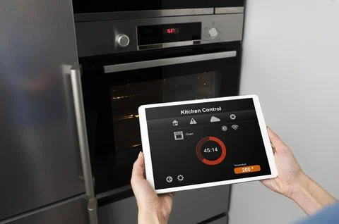 Close up device with kitchen control Stock Photos