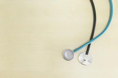 A close up of the device that monitors the heartbeat on a flat wooden floor Stock Photos