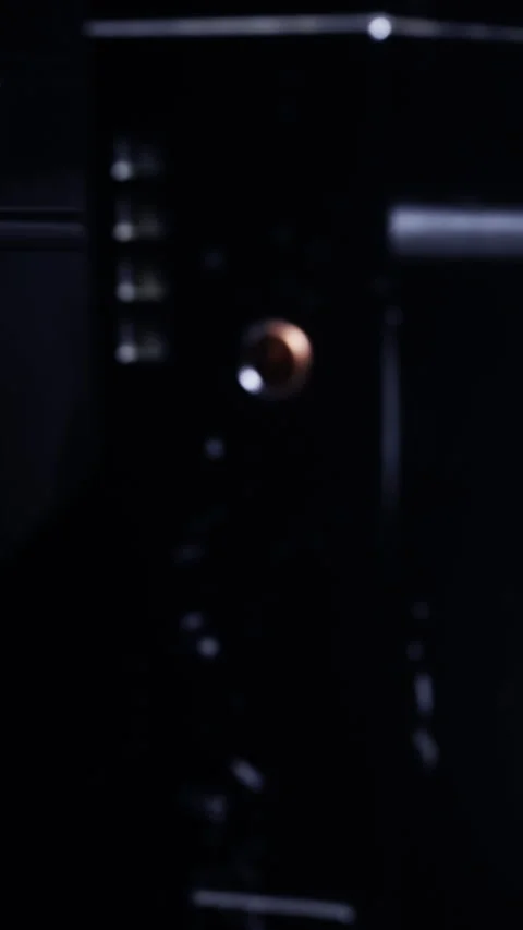 Close up of a device showing a power button in a dark setting Stock Footage 337948427