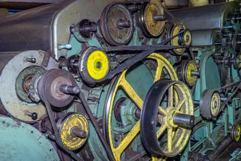 Close-up device of a wool production machine. Traditional woolen factory. Stock Photos