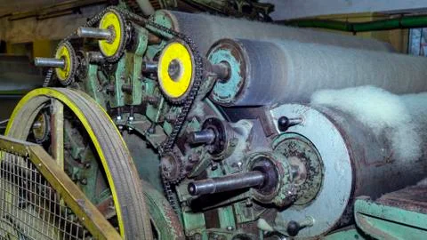 Close-up device of a wool production machine. Traditional woolen factory. Stock Photos