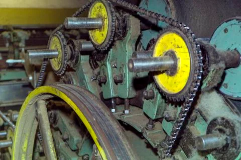 Close-up device of a wool production machine. Traditional woolen factory. Stock Photos