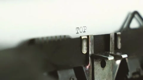 Close up diagonal view typing text " top secret " on a old typewriter Stock Footage 149347781