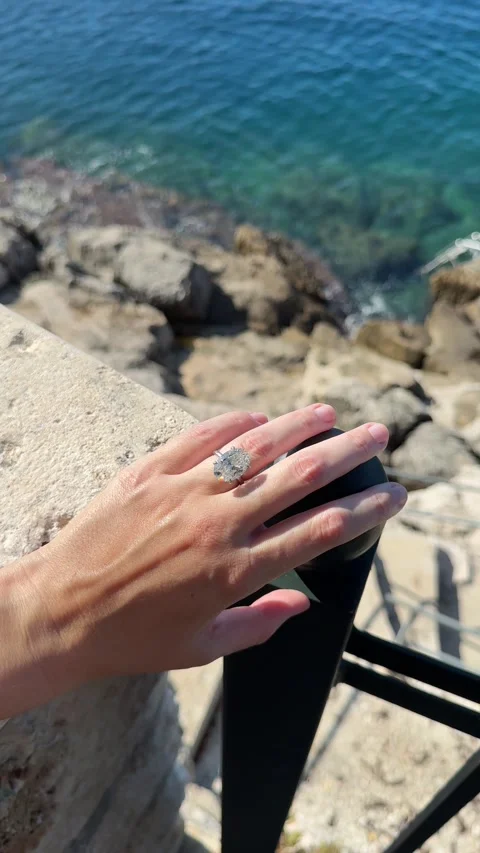 Close up diamond ring above deep blue Adriatic Sea Croatia Stock Footage 319693776
