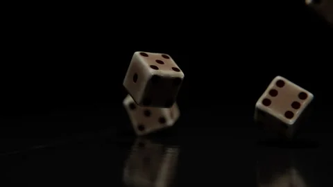 Close up of Dice cubes falling on a wooden table against a dark background Stock Footage 253559158