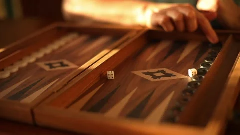 Close Up of Dice Rolling on Backgammon Board Stock Footage 332639908