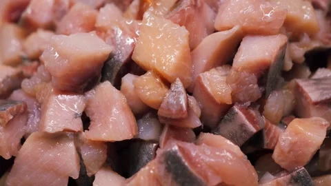 A close-up of diced salted herring, a cooked seafood dish. Food preparation Stock-Footage 333232710