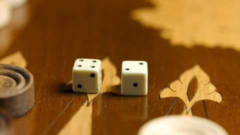 Close up dices on the backgammon surface Stock-Footage 94074663