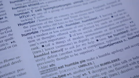 CLOSE UP OF DICTIONARY DEFINITION OF HUMBLE 스톡 동영상 46625868