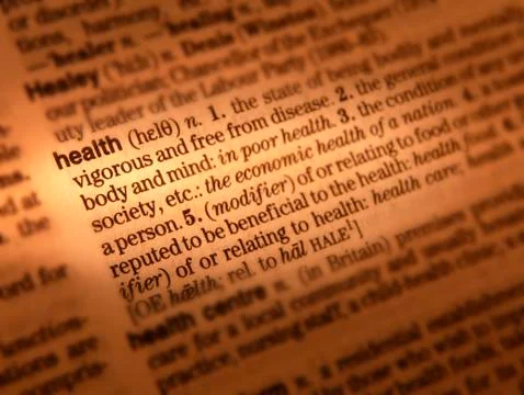 CLOSE UP OF DICTIONARY PAGE SHOWING DEFINITION OF THE WORD HEALTH Stock Photos