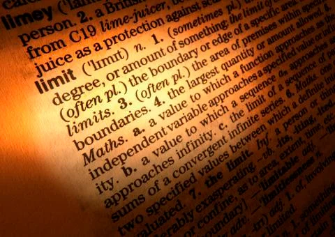 CLOSE UP OF DICTIONARY PAGE SHOWING DEFINITION OF THE WORD LIMIT Stock Photos