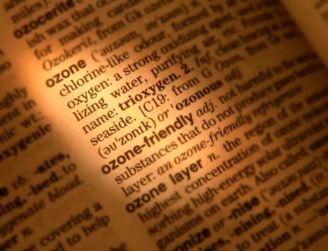 CLOSE UP OF DICTIONARY PAGE SHOWING DEFINITION OF THE WORDS OZONE Stock Photos