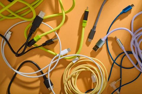 Close-up of different cables with different connections for data transfer. Foto stock