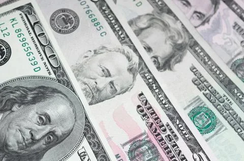 Close up of different dollar bills.. Concept of money and earnings. Money sav Stock Photos