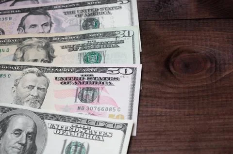 Close up of different dollar bills.. Concept of money and earnings. Money sav Stock Photos