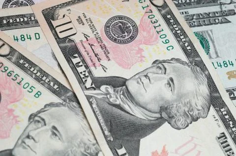 Close up of different dollar bills.. Concept of money and earnings. Money sav Stock Photos