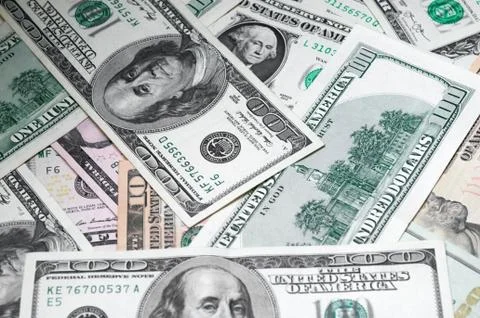 Close up of different dollar bills.. Concept of money and earnings. Money sav Stock Photos