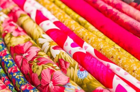 Close up of different fabric of different colors, fabric waiting for sewing Stock Photos