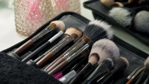 Close-up of different make-up brushes. Make-up artist tools. Cosmetics kit. Video stock 199839668