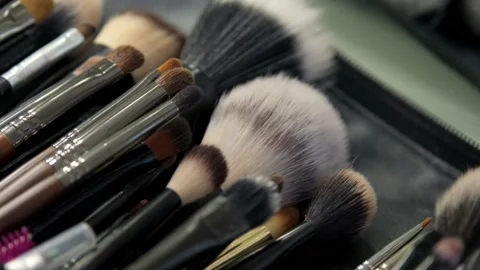 Close-up of different make-up brushes. Make-up case for the artist. Video stock 199839698