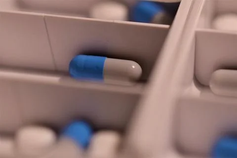 Close up of different pills prepared in tablets boxes Stock Photos