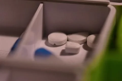 Close up of different pills prepared in tablets boxes Stock Photos