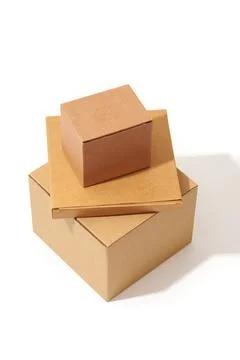 Close-up of different shaped cardboard boxes isolated on white background Stock Photos