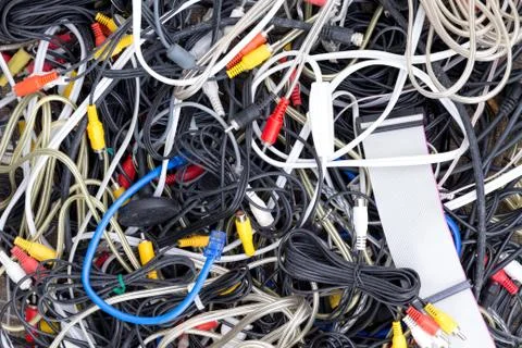 Close-up of different tangled cables and wires Stock Photos