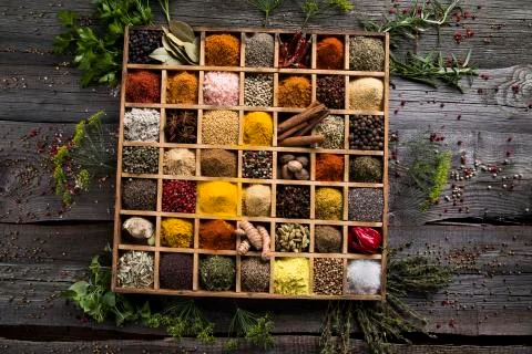 Close-up of different types of Assorted Spices in a wooden box Free Stock Photos