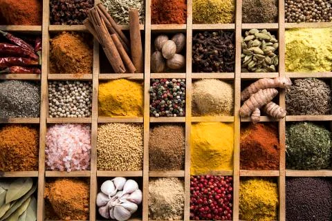 Close-up of different types of Assorted Spices in a wooden box Free Stock Photos