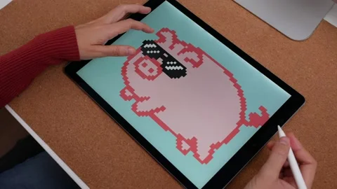 Close up of digital artist hands creating an NFT Stock Footage 165241315