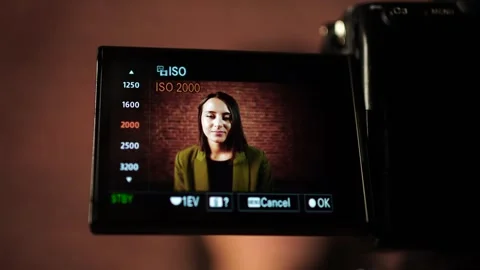 Close up of digital camera screen set video recording settings, woman in Vidéo 270444656