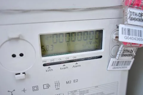 Close up of digital electricity meter display in utility box 스톡 사진