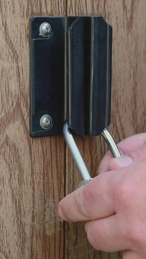 Close up of a digital padlock with a four digit code used for securing door.. Stock Footage 310713996