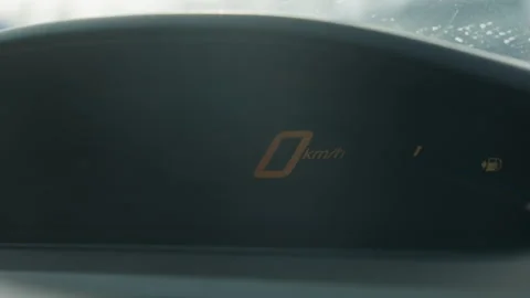 Close up digital speedometer blinking triple digit then resetting to zero kmh Video stock 310183188