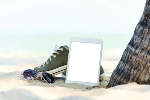 Close-up digital tablet on the beach Stock Photos