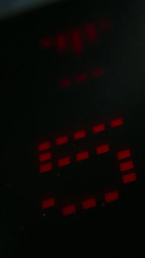 Close up of digital timer with red LED numbers counting down from ten to one in Stock Footage 341012105