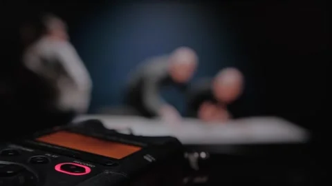 Close up digital voice audio recorder, blinking REC button. Police interrogation Stock Footage 256203296