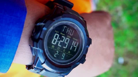 Close-up of a digital watch on a man's hand Stock Footage 235361966