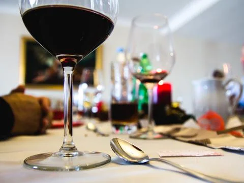 Close up of dinner ant tableware during a holiday meal. Blurred, abstract. Stock Photos