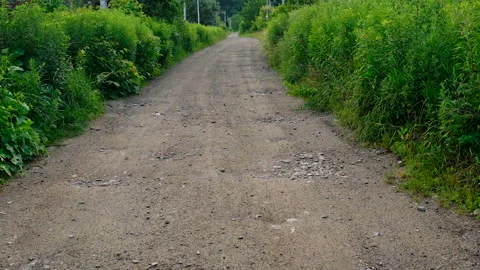 Close-up of a dirt road. Selective focus. Stock Footage 318180413