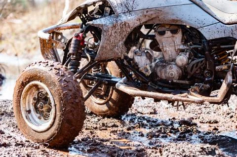 Close-up of dirty atv suspension and angine Stock Photos