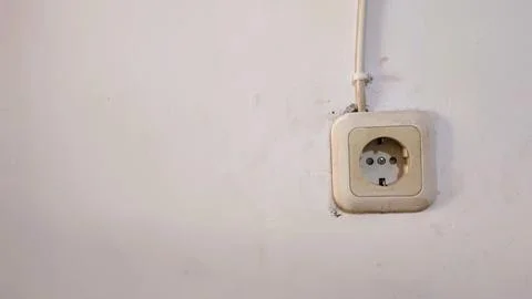 Close-up of a Dirty Electrical Outlet on a Wall Stock Photos