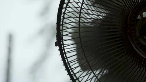 Close-up of a dirty fan rotating back and forth Vídeos de archivo 315078373