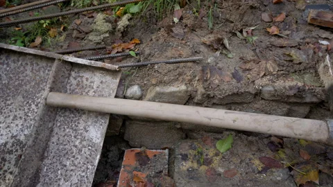 Close up of dirty mattock, tool for digging Stock Footage 158978627